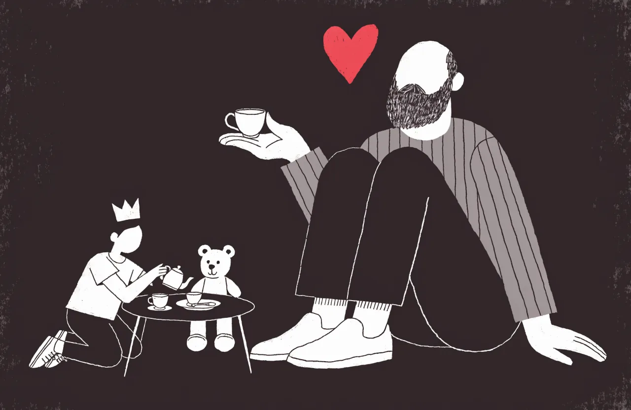 Father-daughter activities: dad at a tiny tea party while his daughter pours pretend tea
