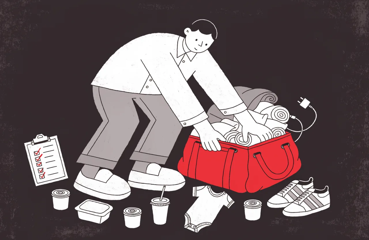 Hospital bag for dad: packing an overstuffed duffel with a baby onesie and checklist